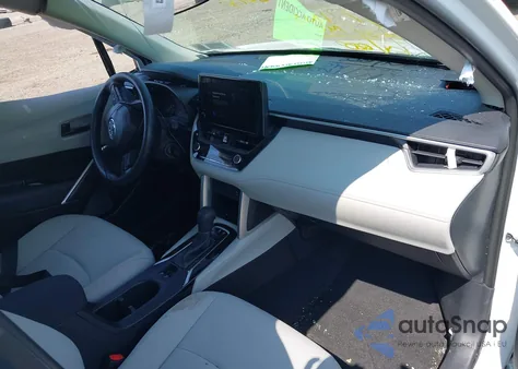 2023 Toyota Corolla Cross L from USA, damaged, VIN 7MUAAABG0PV056373